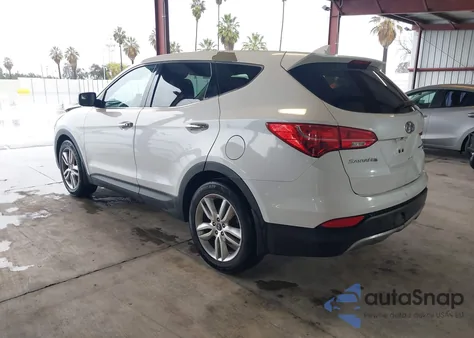 2013 Hyundai Santa Fe Sport 2.0T z USA, uszkodzony, nr VIN 5XYZWDLA1DG098263